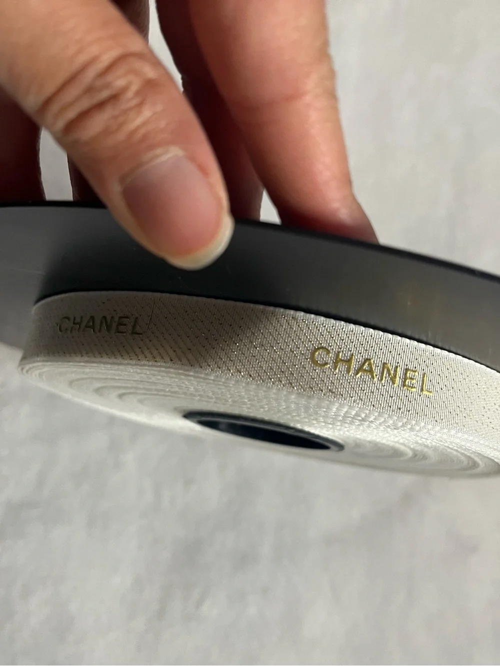 CHANEL Embossed Logo Grosgrain Ribbon - Ivory with Gold